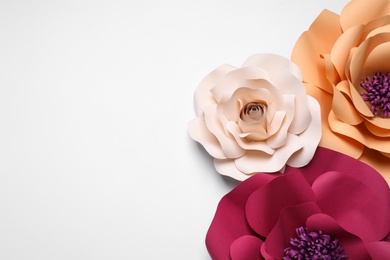 Photo of Different beautiful flowers made of paper on white background, flat lay. Space for text