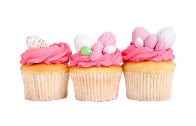 Photo of Tasty decorated Easter cupcakes isolated on white