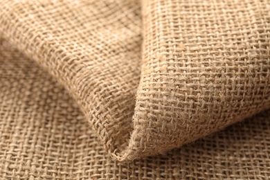 Sustainable hemp fabric as background, closeup