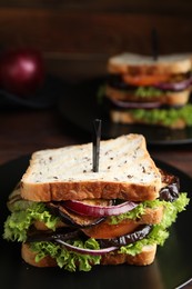 Photo of Delicious fresh eggplant sandwich on plate, closeup