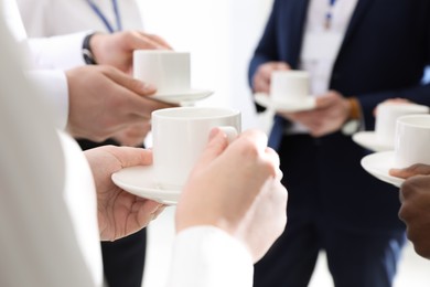 Photo of Group of people during coffee break, closeup