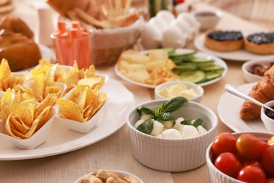 Photo of Dishes with different food on table. Luxury brunch