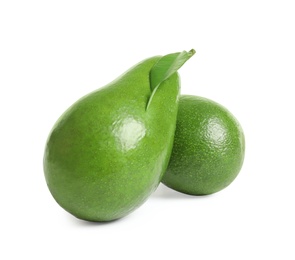 Photo of Ripe fresh avocados on white background