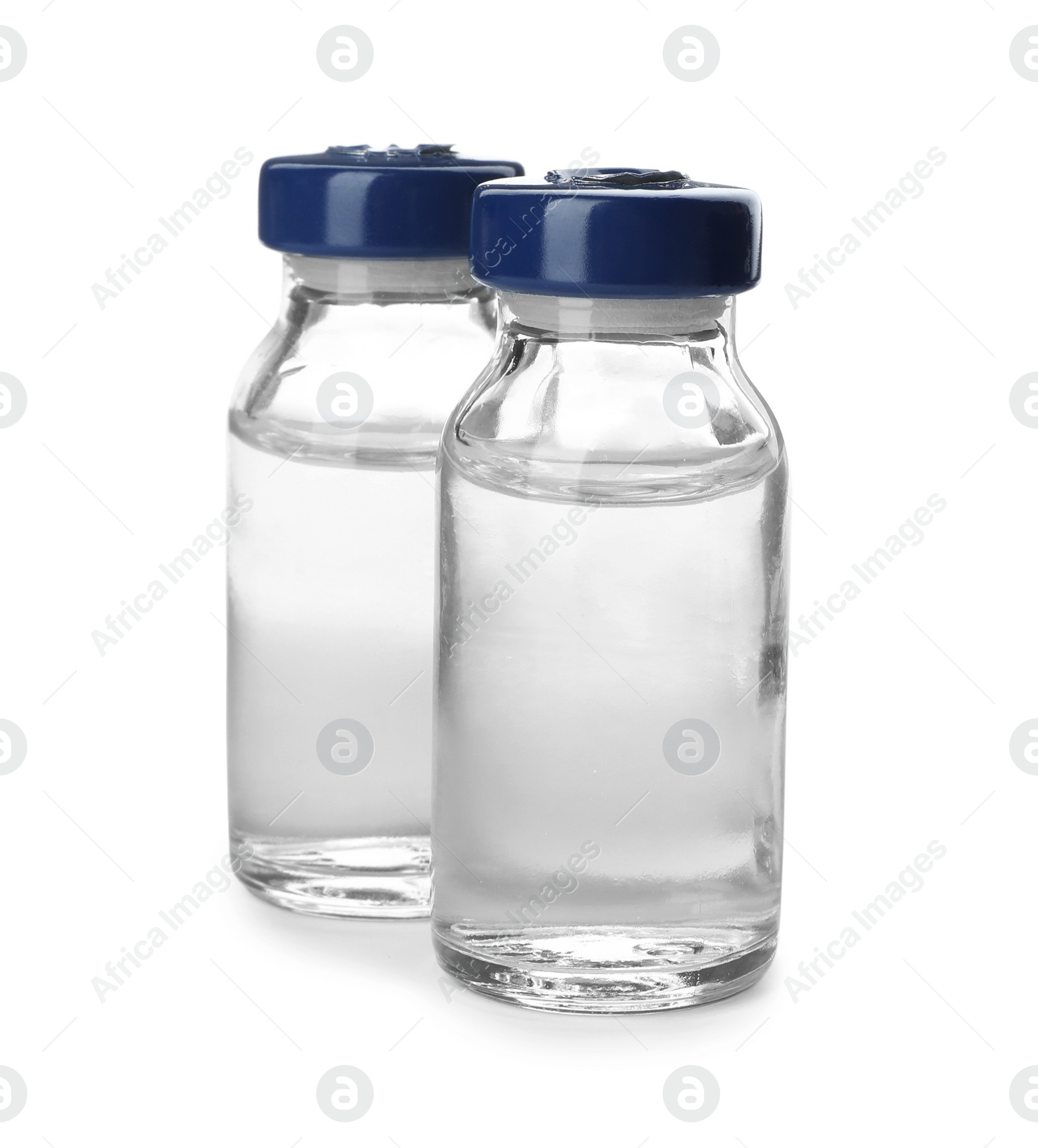 Photo of Medical vials with solution for injection on white background