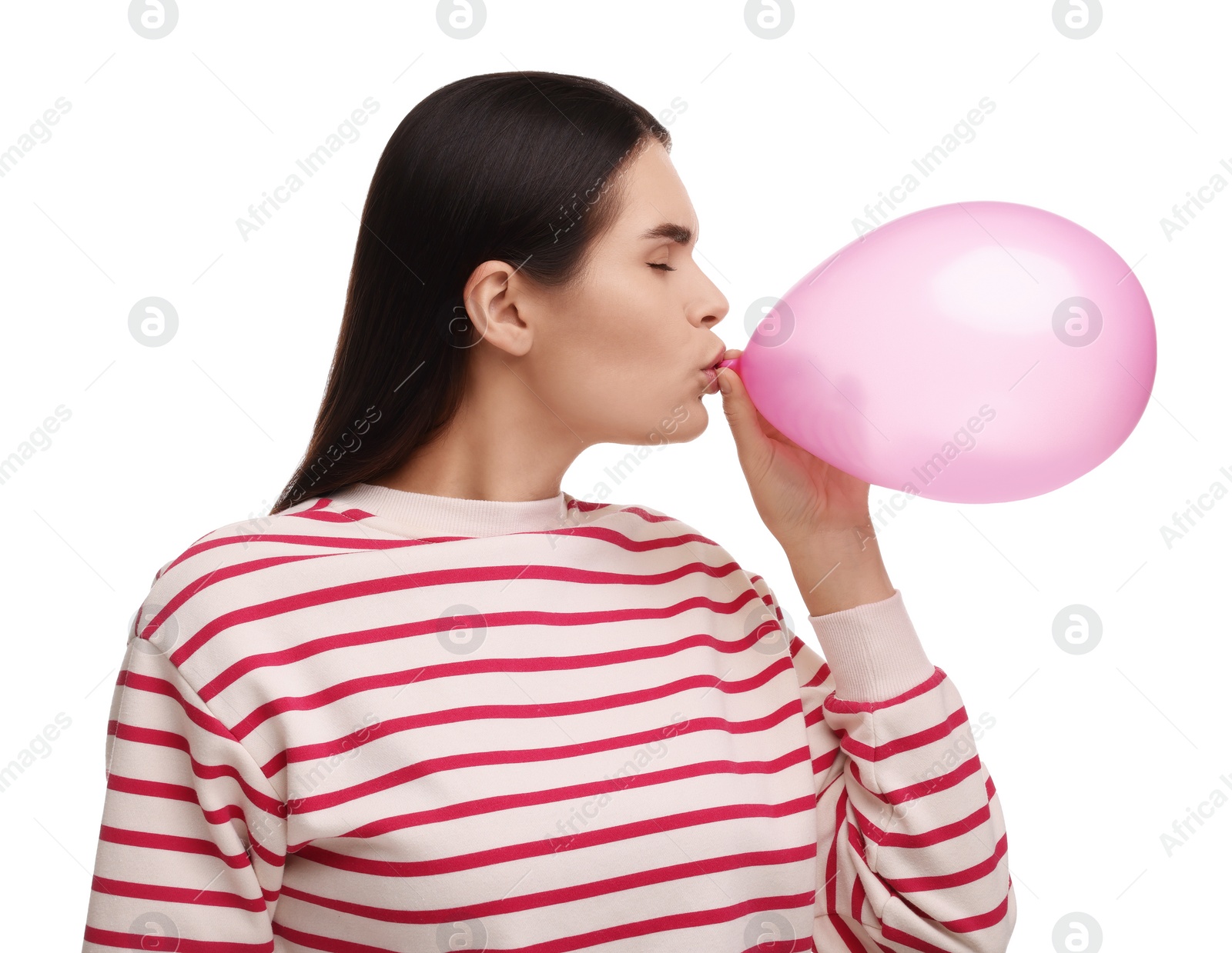 Photo of Woman inflating pink balloon on white background