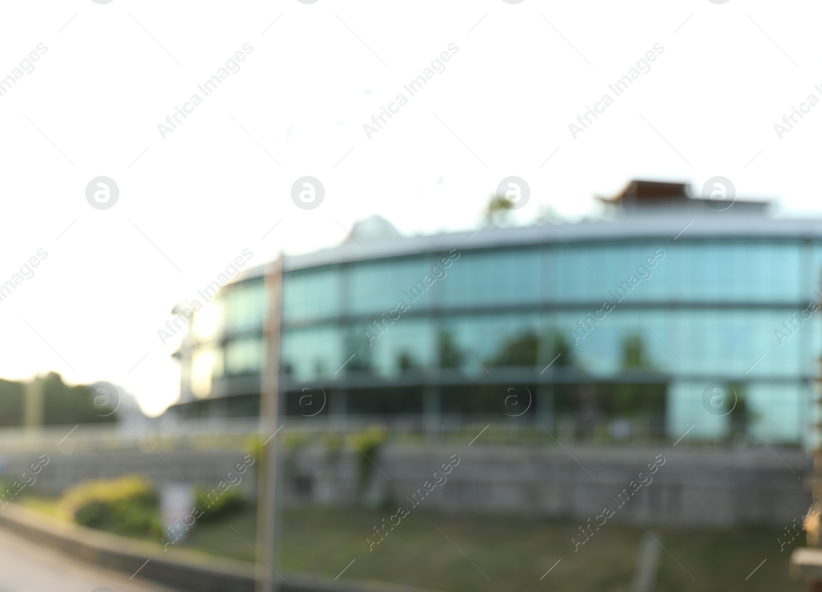 Photo of Blurred view of modern buildings with windows. Urban architecture