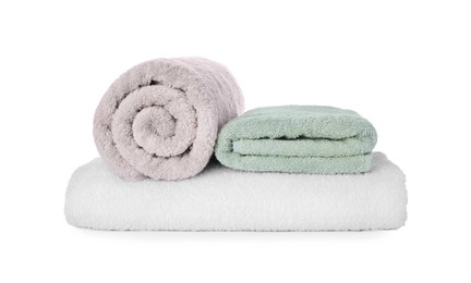 Fresh clean towels for bathroom on white background