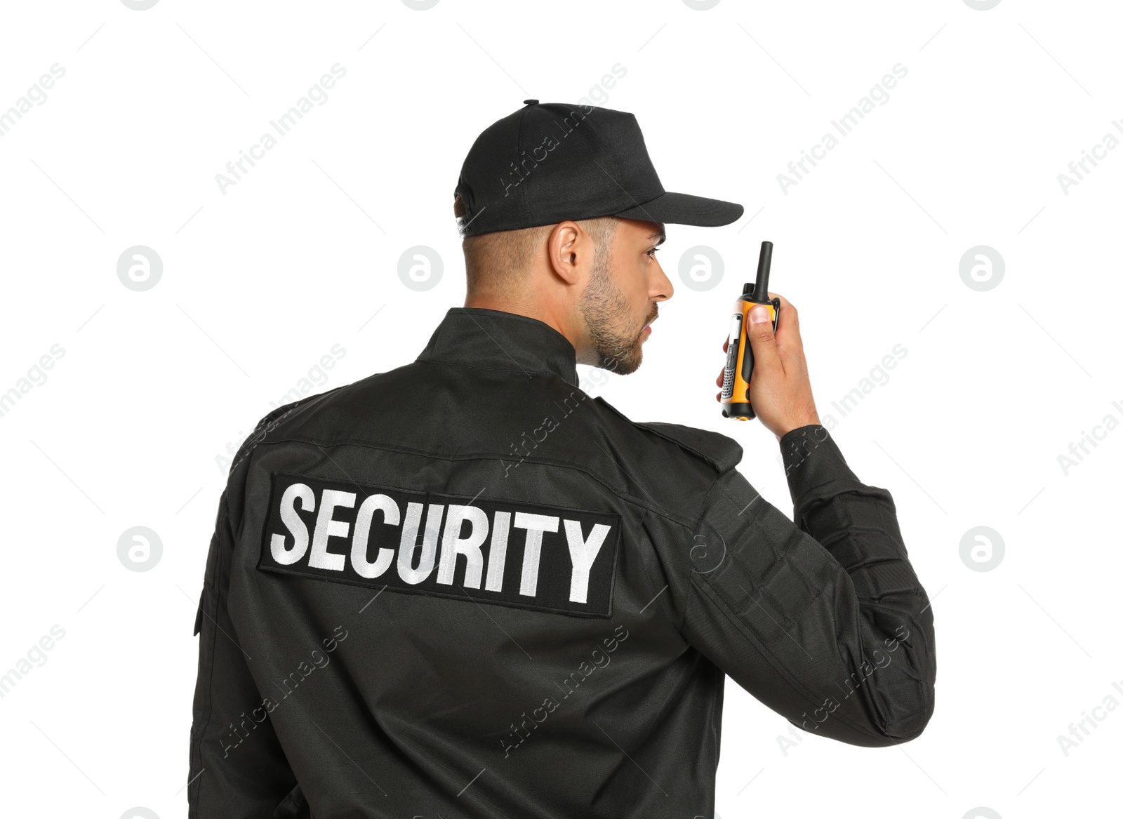 Photo of Male security guard in uniform using portable radio transmitter on white background