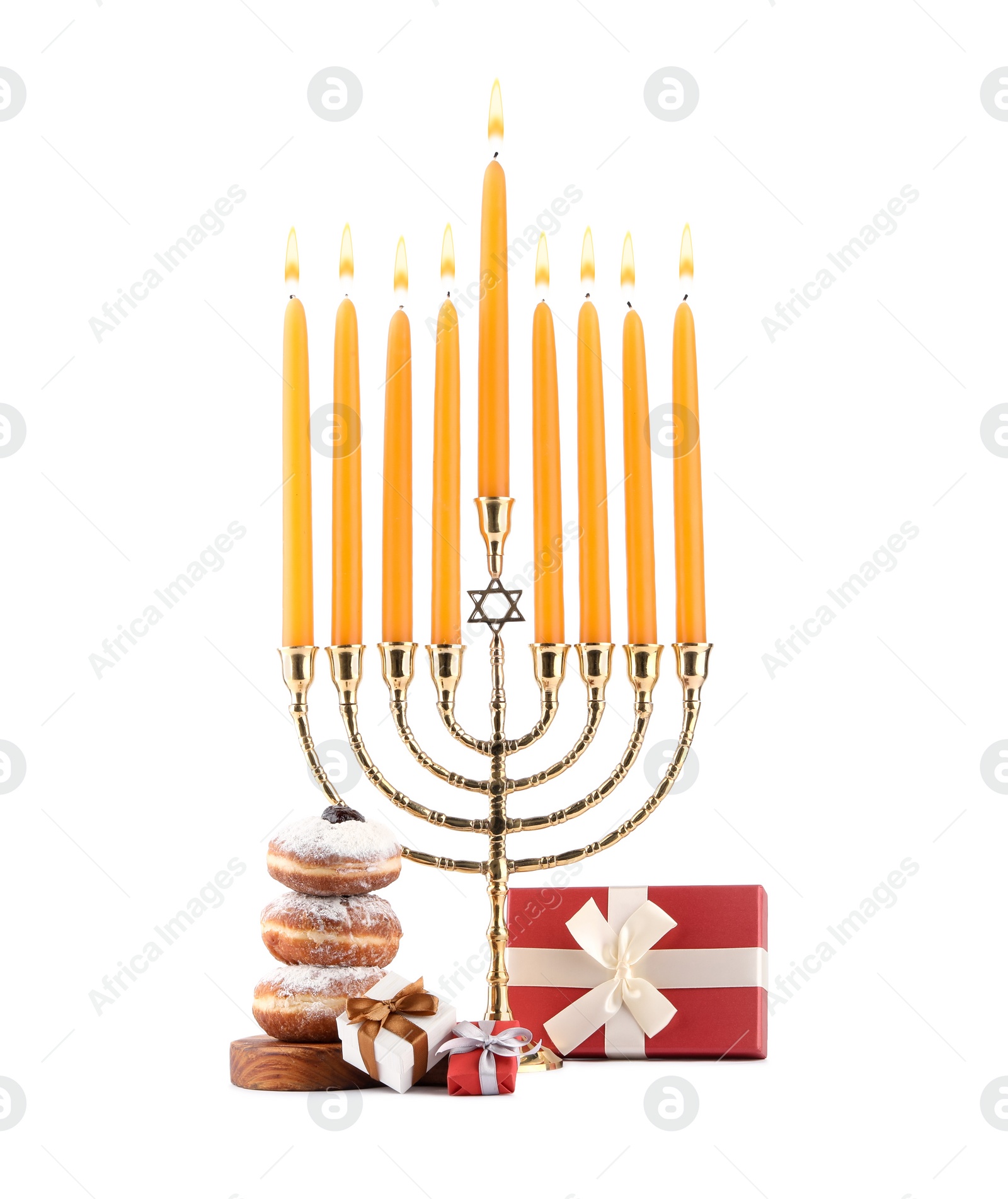 Photo of Hanukkah celebration. Menorah with candles, gift boxes and donuts isolated on white