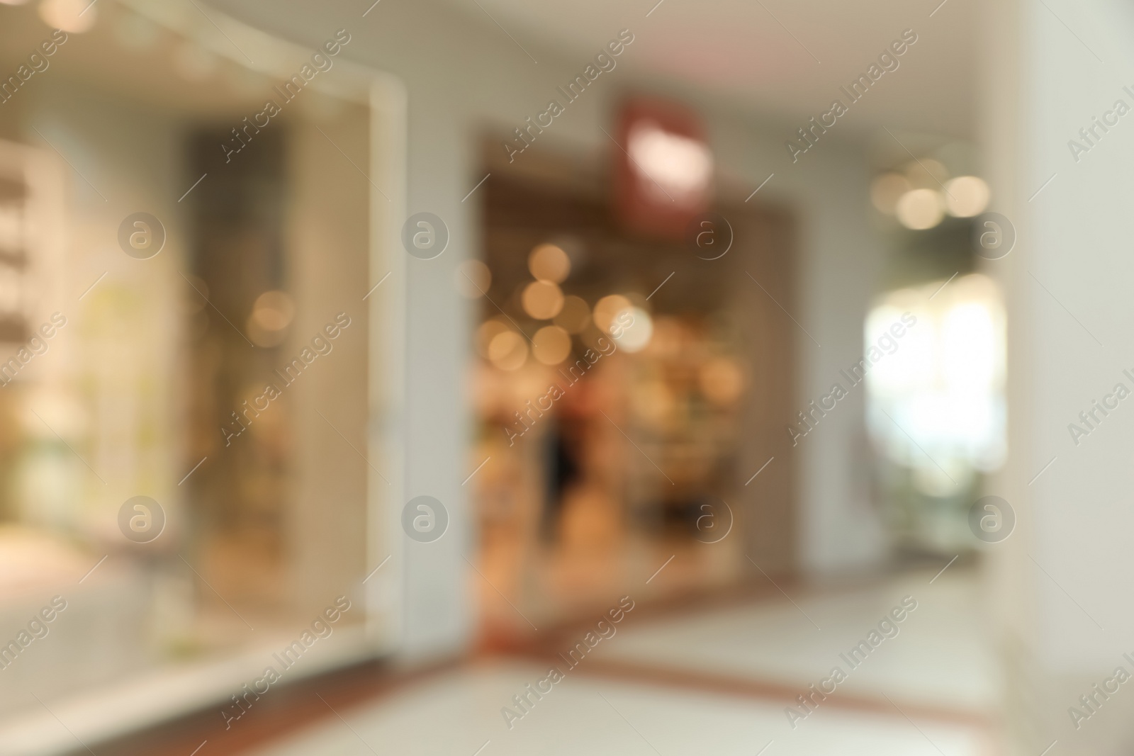 Photo of Blurred view of shopping mall interior. Bokeh effect