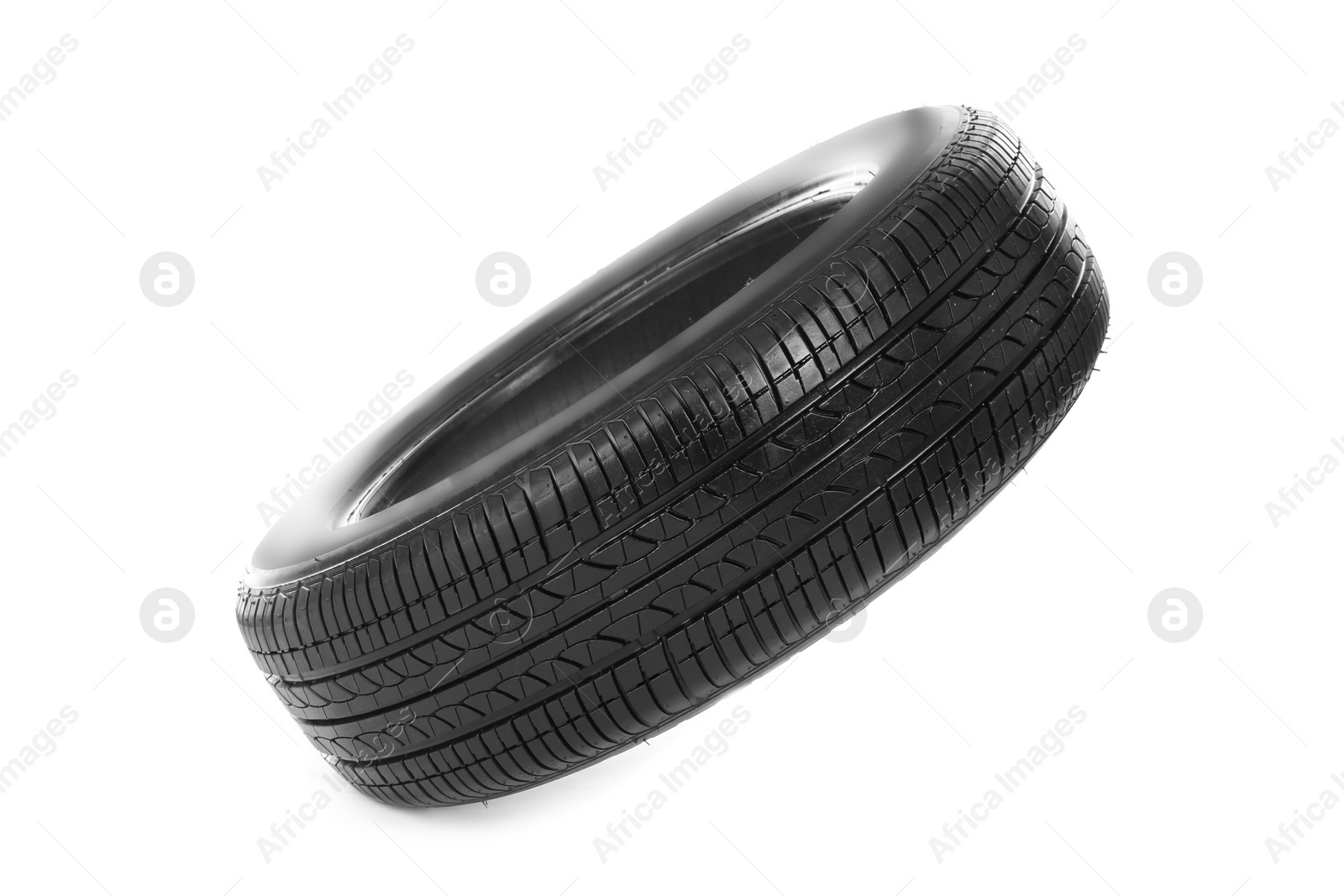 Photo of Car tire on white background