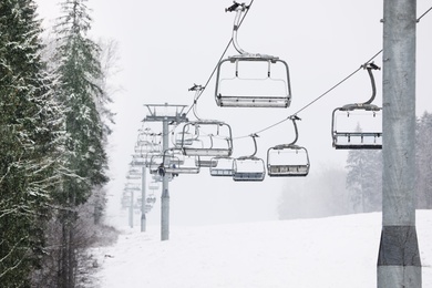 Ski lift at mountain resort. Winter vacation