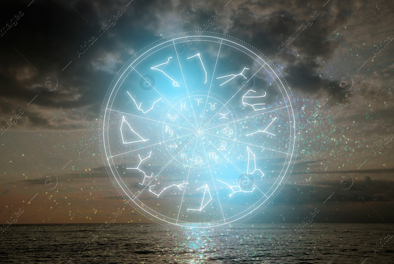 Image of Zodiac wheel with 12 astrological signs and star constellations and seascape on background