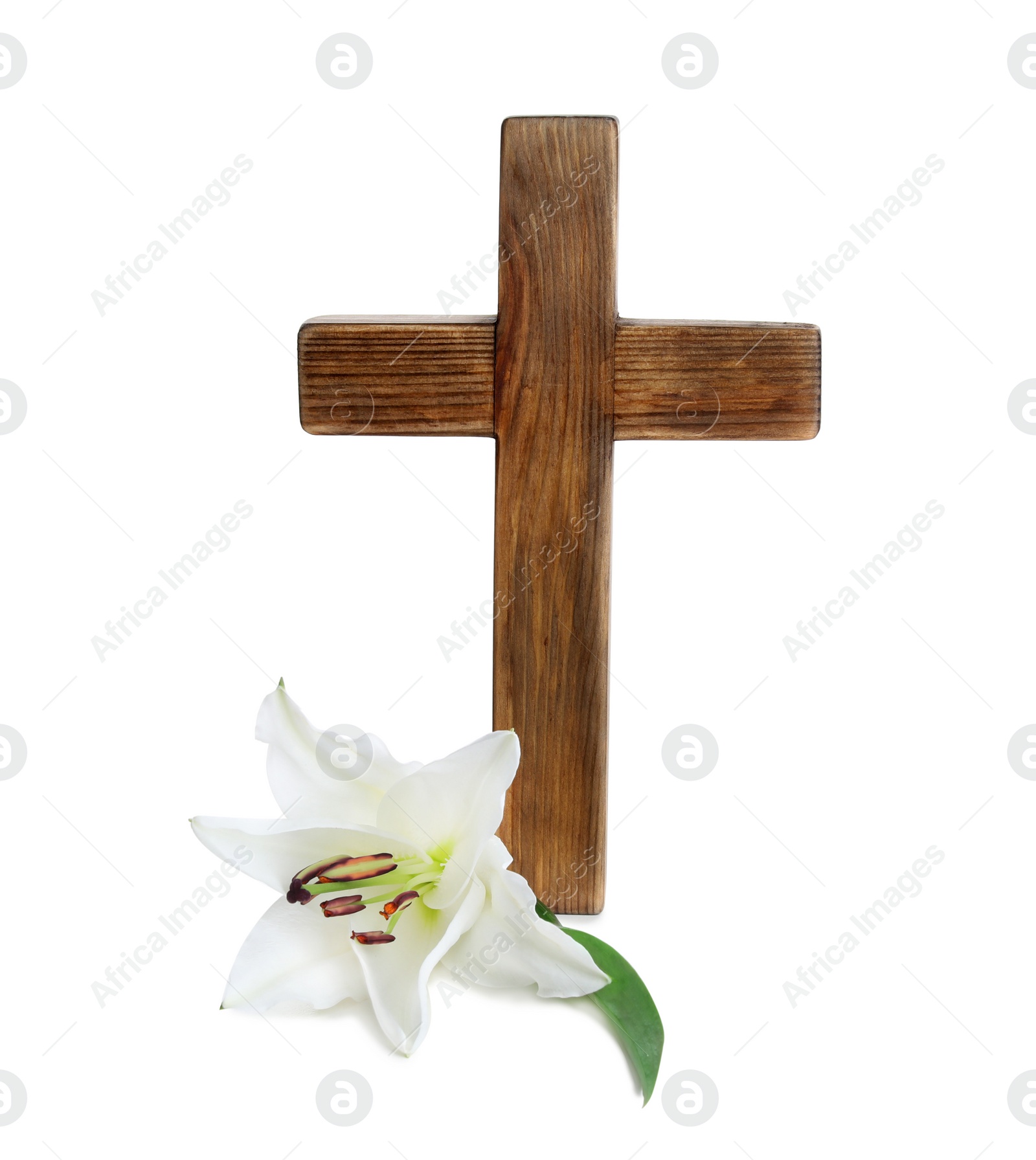 Photo of Wooden cross and blossom lily on white background