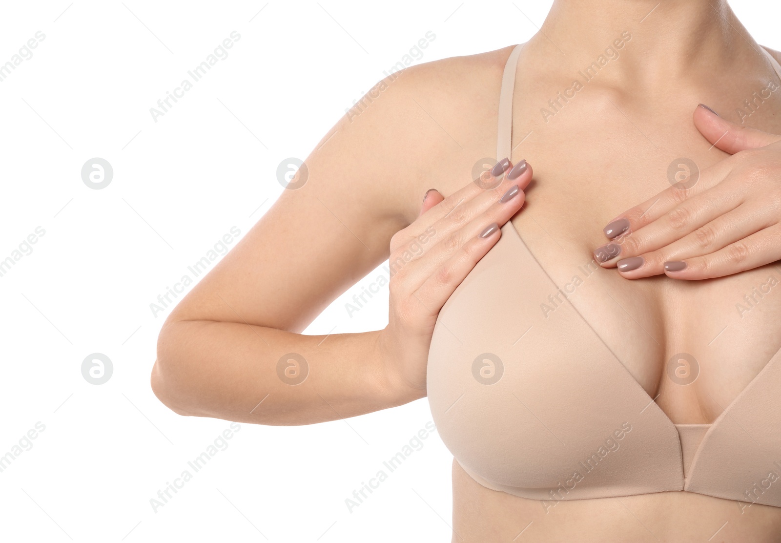 Photo of Woman checking her breast on white background, closeup