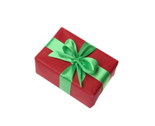 Photo of Red gift box with green bow isolated on white