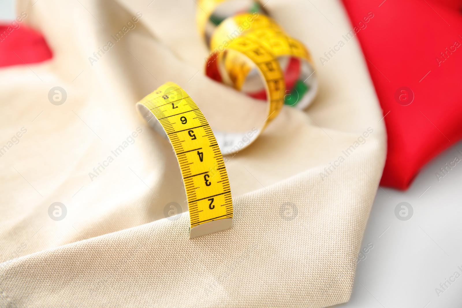 Photo of Measuring tape for tailoring on fabrics