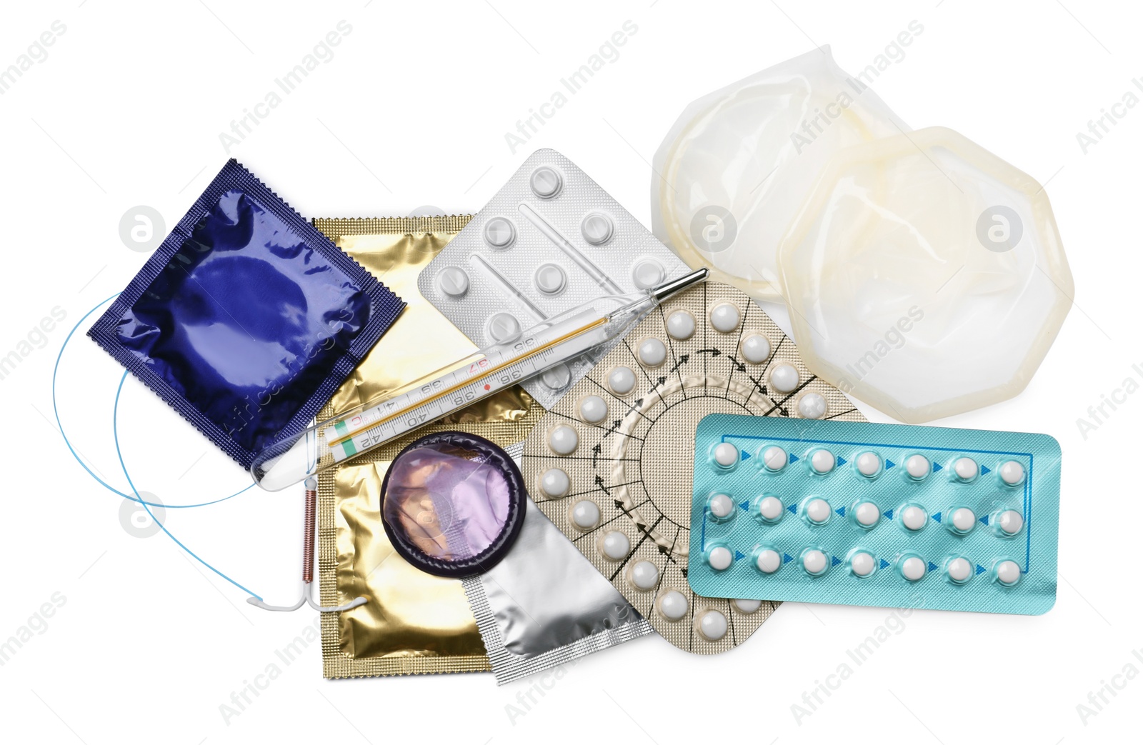 Photo of Contraceptive pills, condoms, intrauterine device and thermometer isolated on white, top view. Different birth control methods