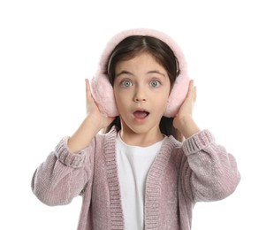 Photo of Cute girl wearing stylish earmuffs on white background