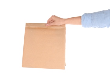 Photo of Woman holding paper bag isolated on white. Mockup for design