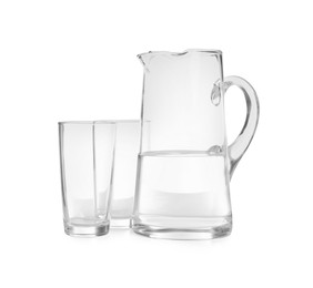 Photo of Jug of water and glasses isolated on white