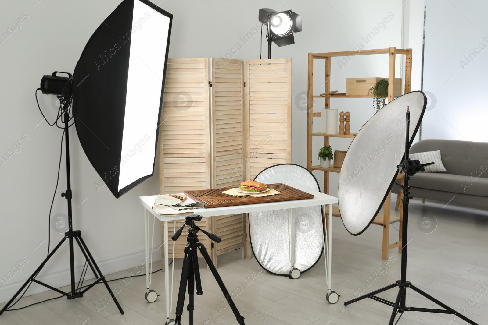 Photo of Tasty sandwich on table in photo studio. Food photography