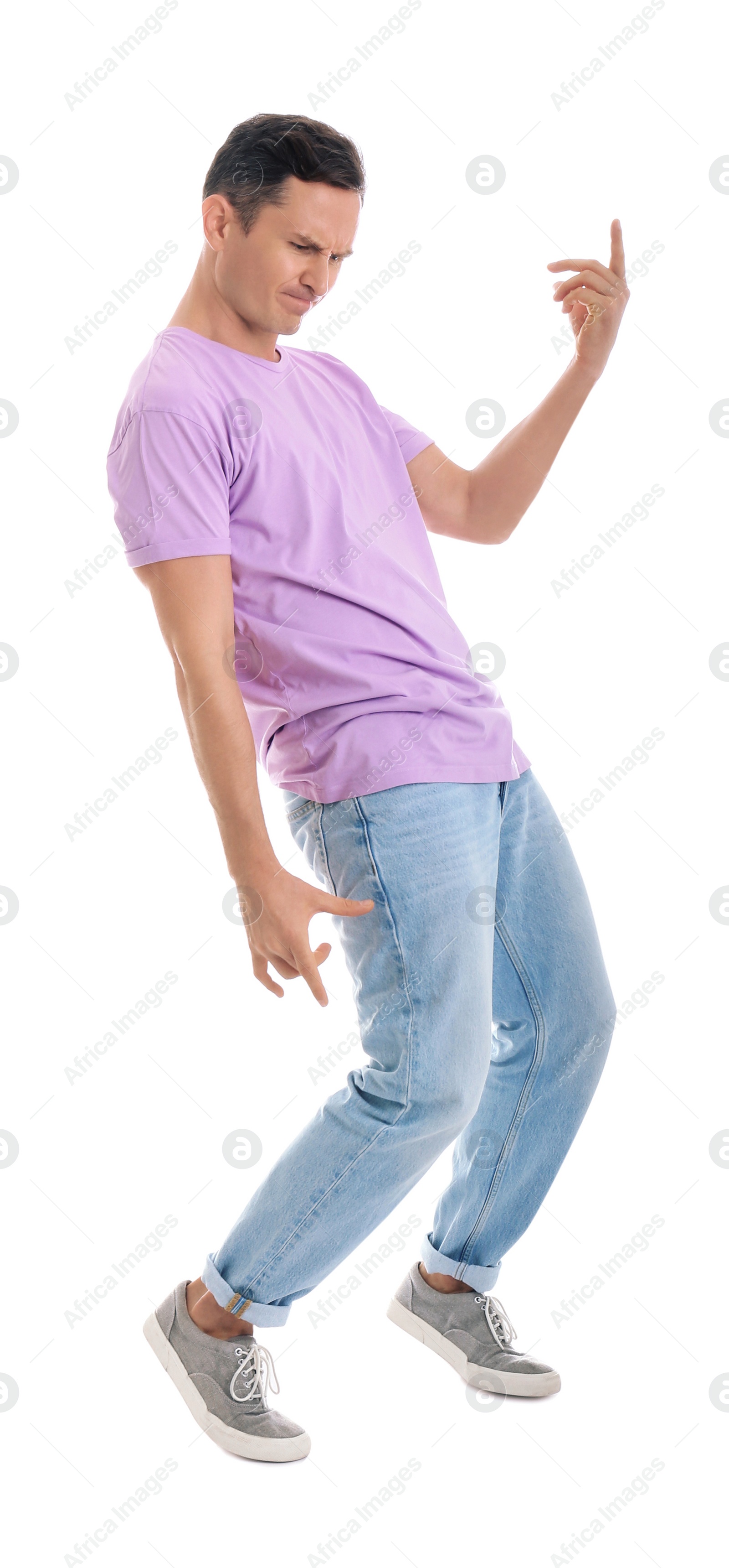 Photo of Happy attractive man dancing on white background