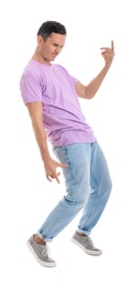 Happy attractive man dancing on white background