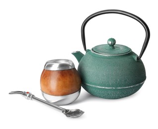 Photo of Calabash with mate tea, bombilla and teapot on white background