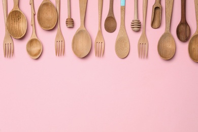 Photo of Set of modern cooking utensils on pink background, flat lay. Space for text