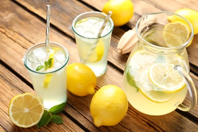 Natural lemonade with mint on wooden table. Summer refreshing drink