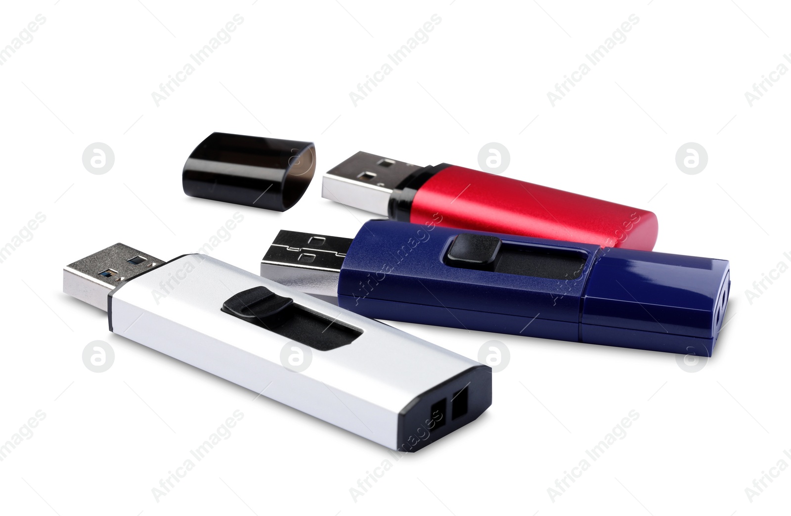 Photo of Different usb flash drives on white background