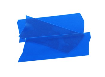 Pieces of blue insulating tape on white background, top view