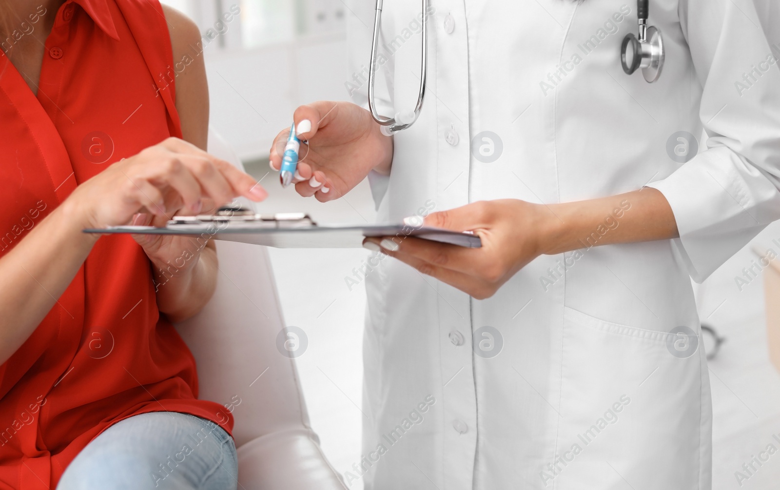 Photo of Patient having appointment with doctor in hospital