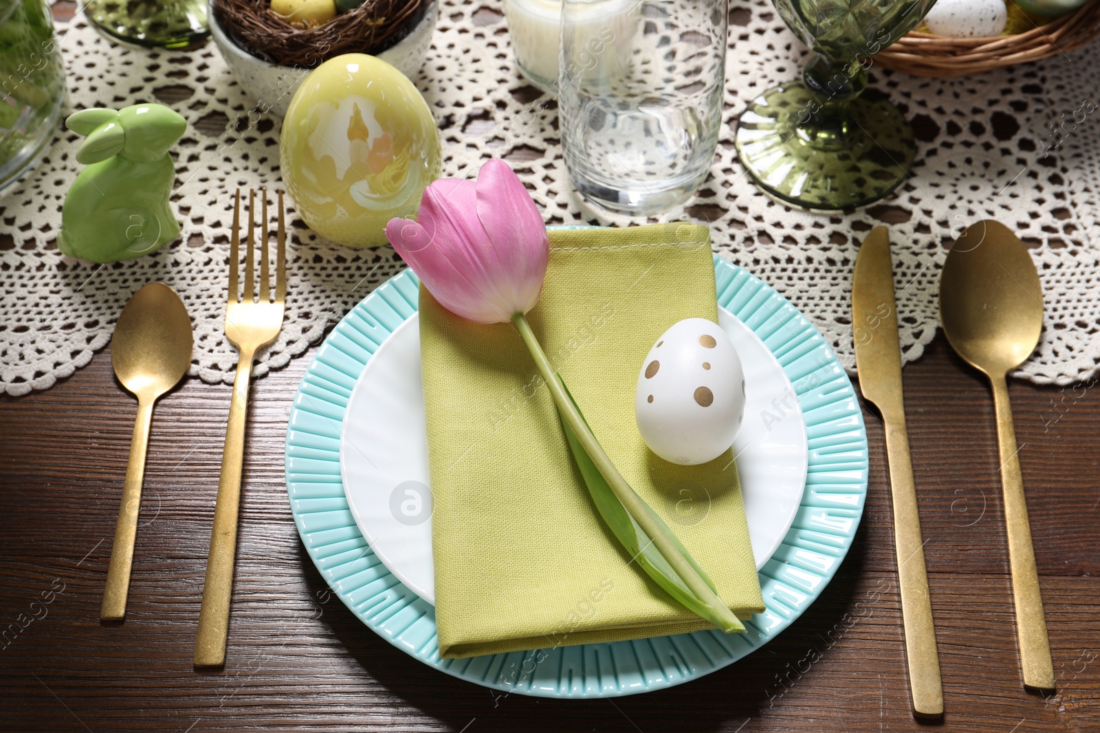 Photo of Festive table setting with beautiful tulip. Easter celebration