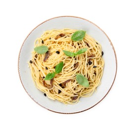 Delicious pasta with anchovies, olives and basil isolated on white, top view