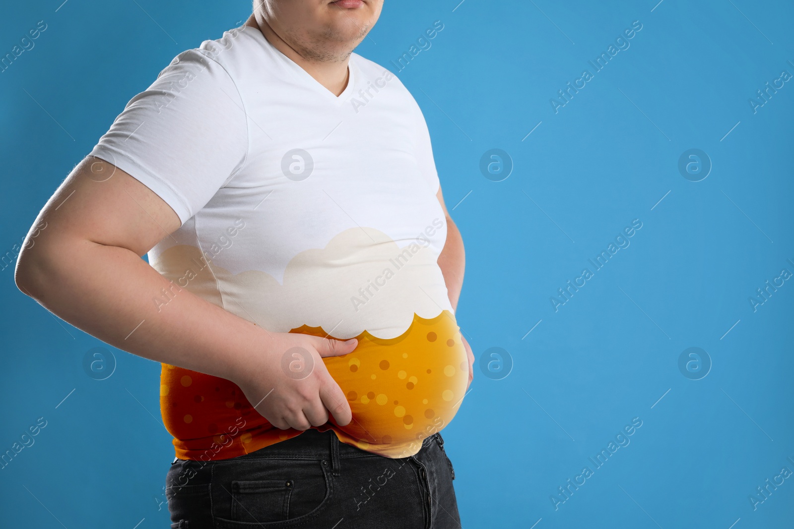 Image of Beer belly problem. Overweight man on blue background, closeup