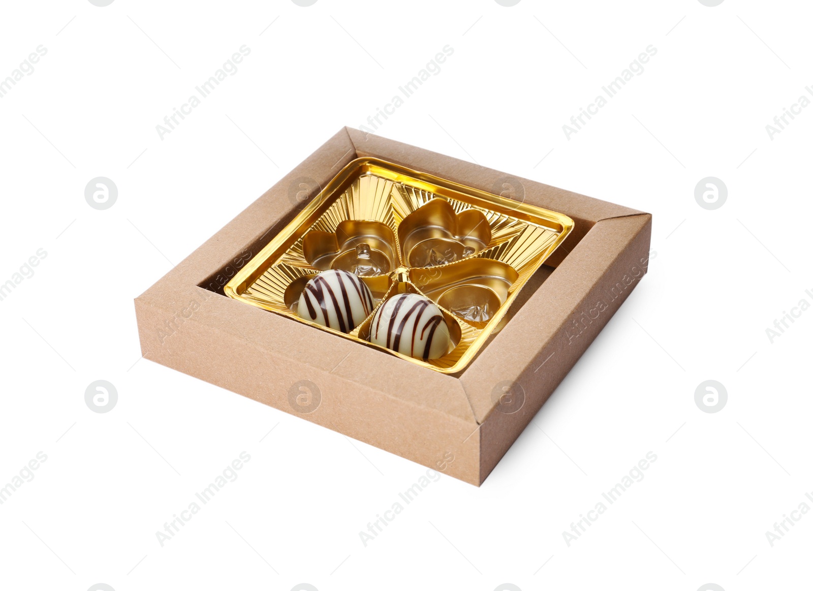 Photo of Partially empty box of chocolate candies isolated on white