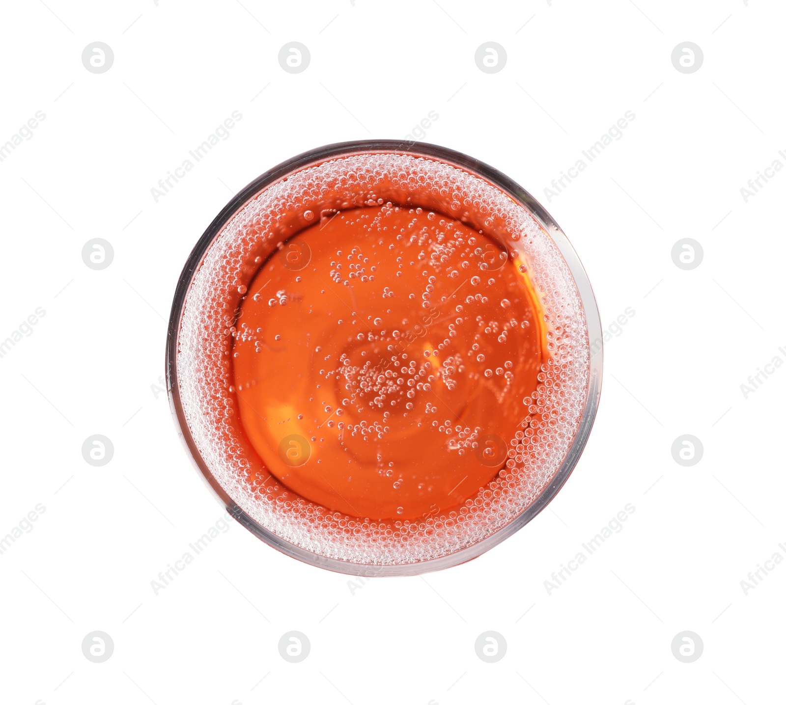 Photo of Glass of rose champagne isolated on white, top view