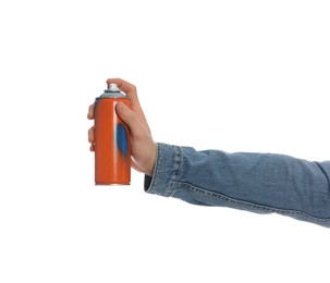 Man holding can of spray paint on white background, closeup