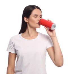 Photo of Beautiful young woman drinking from tin can on white background
