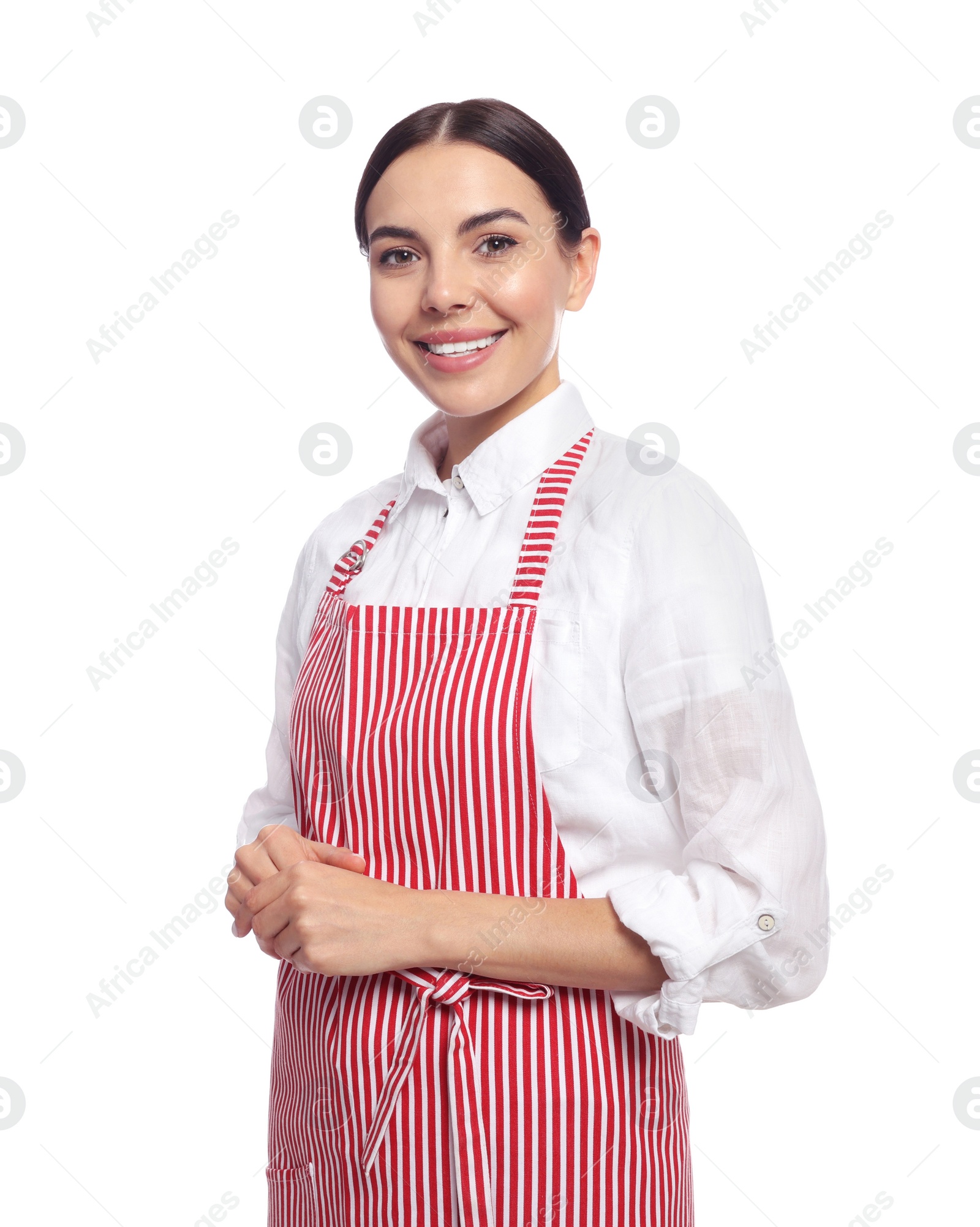 Photo of Young woman in red striped apron on white background