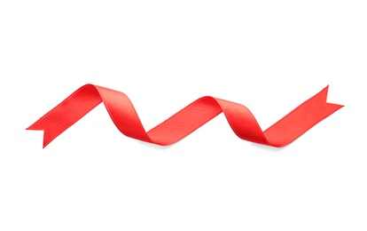 Simple red ribbon on white background, top view