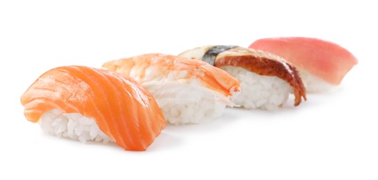 Photo of Delicious nigiri sushi isolated on white. Traditional Japanese cuisine