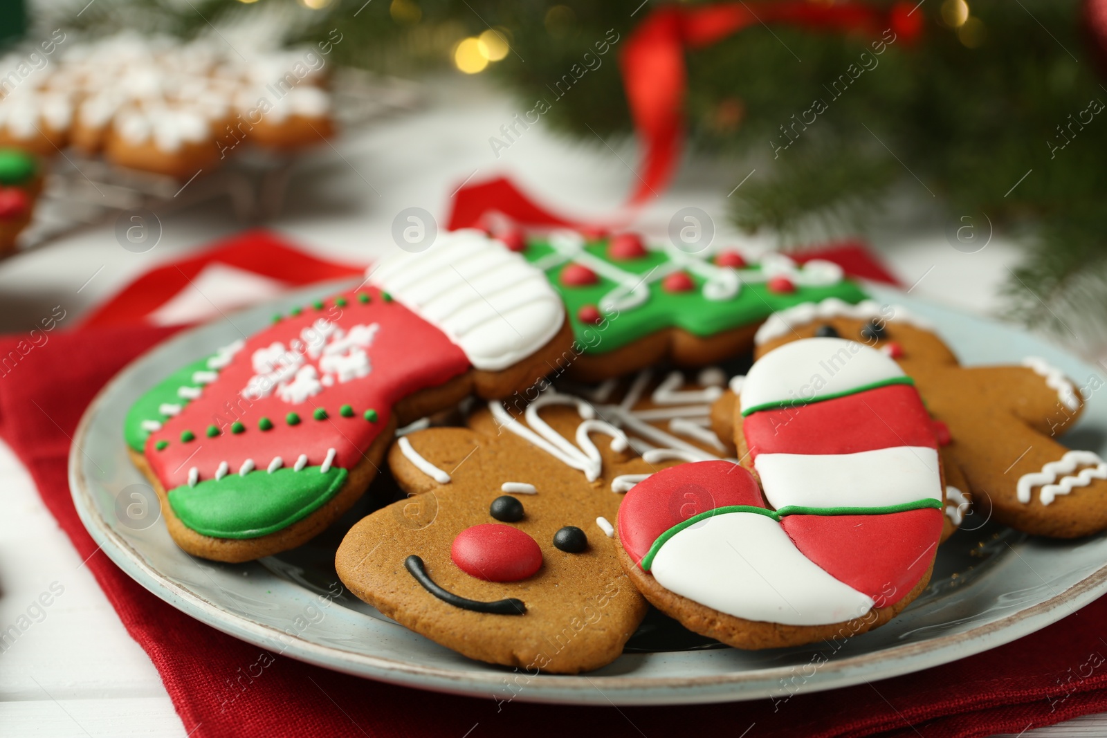 Photo of Tasty homemade Christmas cookies on white table, closeup