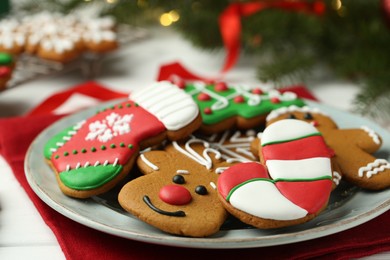 Tasty homemade Christmas cookies on white table, closeup