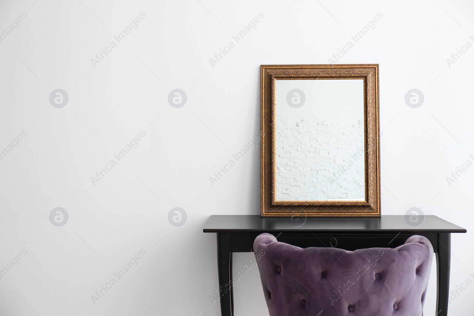 Photo of Modern makeup room interior with dressing table and mirror