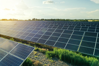 Photo of Solar panels installed outdoors. Alternative energy source