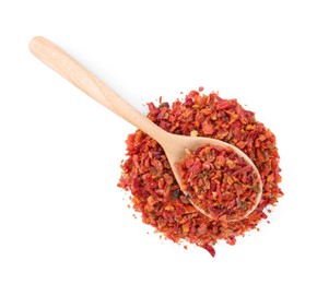 Photo of Aromatic spice. Red chili pepper flakes and spoon isolated on white, top view