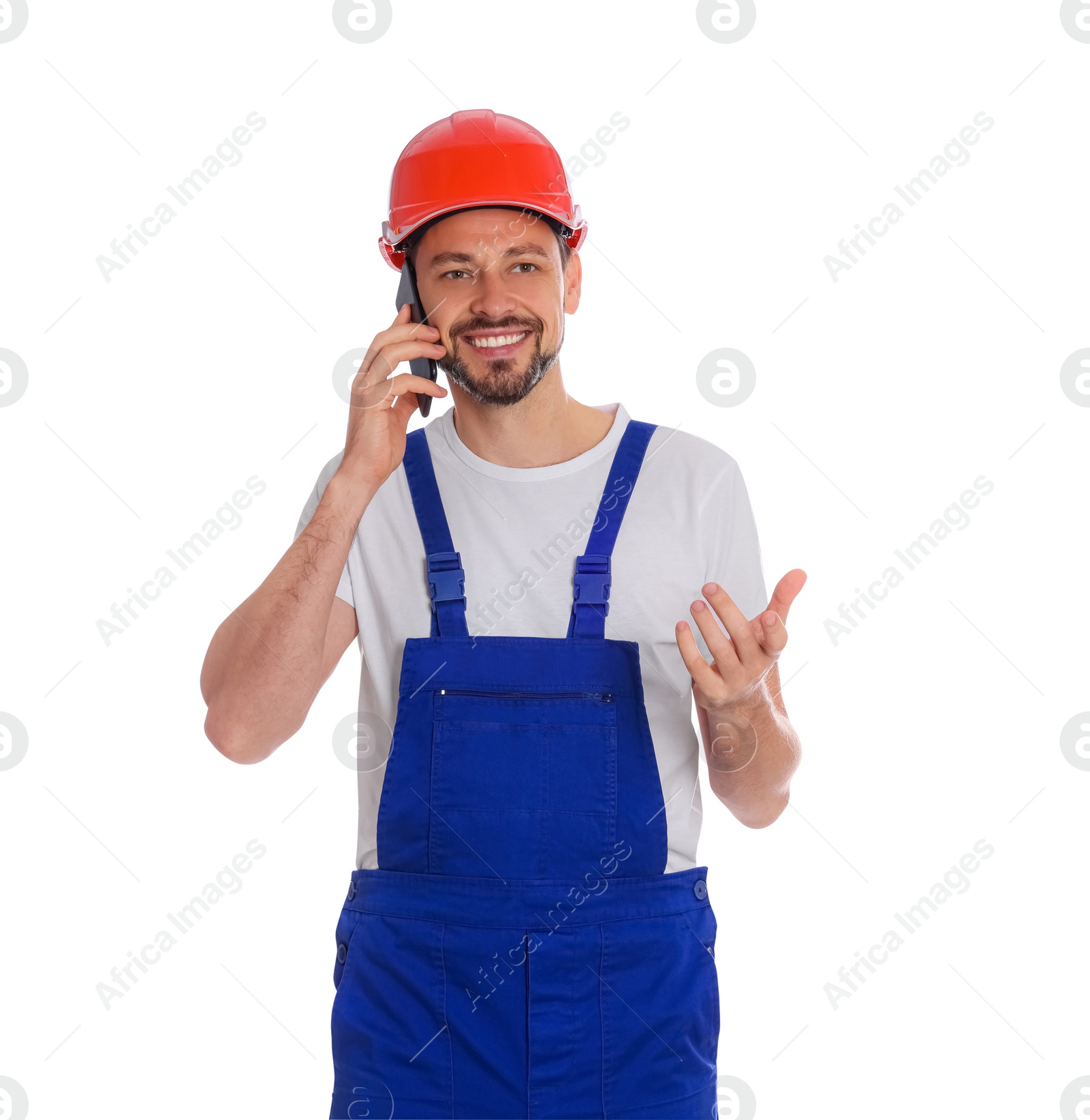 Photo of Professional repairman in uniform talking on phone against white background